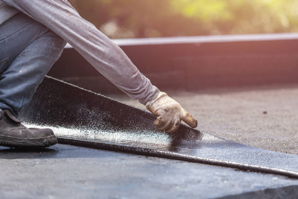 Professional Basement Waterproofing technician working in Westport, NC